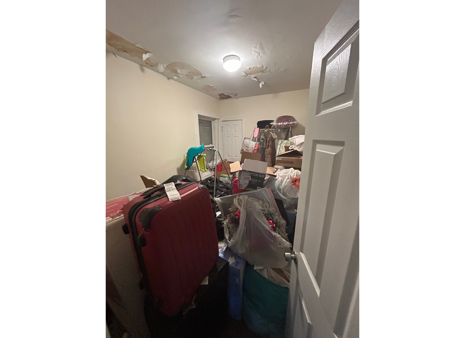 2107 West 70th Place Chicago, IL 60636 - Photo 11 of 19 a view of storage and utility room with windows