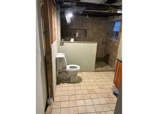 a bathroom with a sink and a toilet