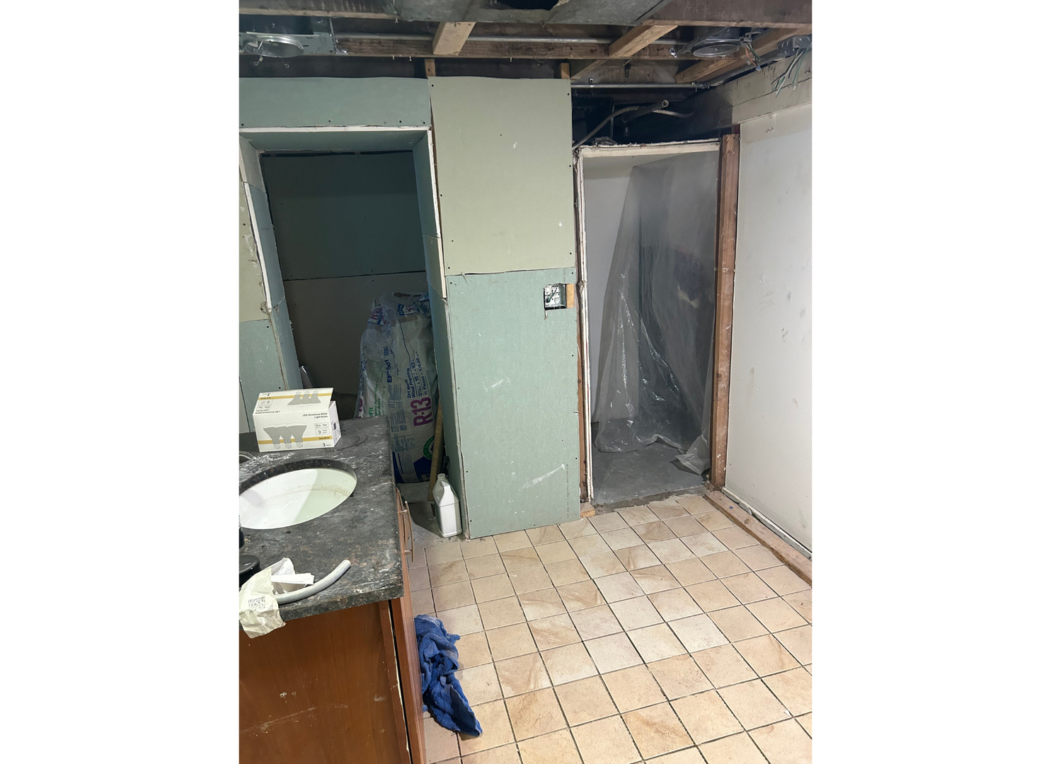 2107 West 70th Place Chicago, IL 60636 - Photo 17 of 19 a bathroom with a sink and a mirror