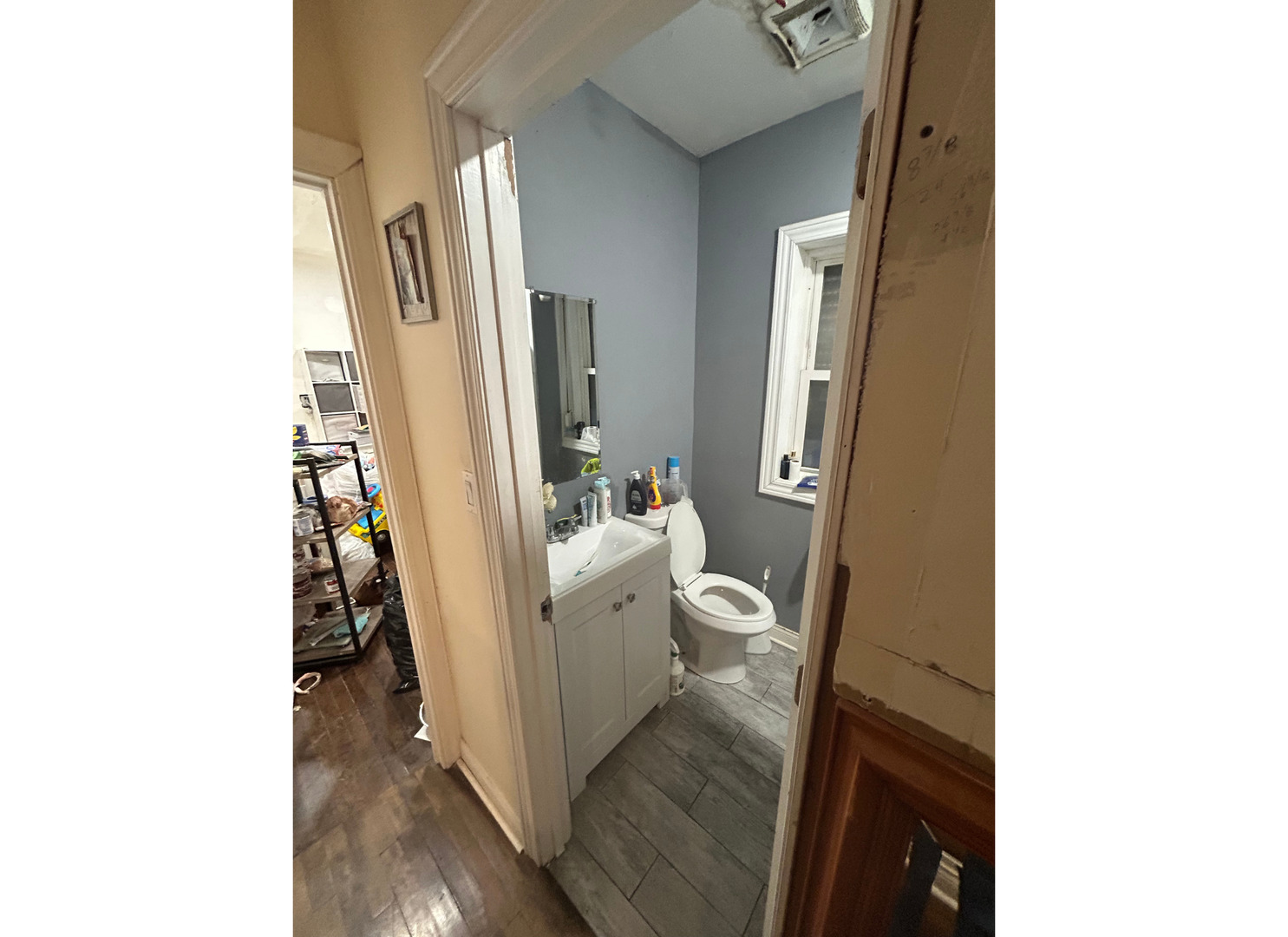 2107 West 70th Place Chicago, IL 60636 - Photo 9 of 19 a view of a hallway with a white walls