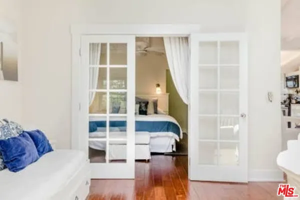 a living room with a furniture and a window