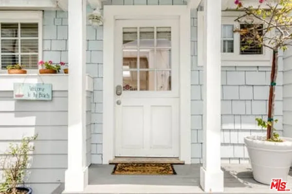 a view of brick house with front door