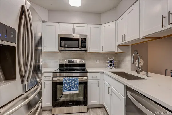 $345,000 | 10494 West Dartmouth Avenue, Lakewood, CO 80227