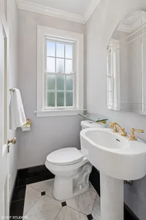 a bathroom with a sink and a toilet