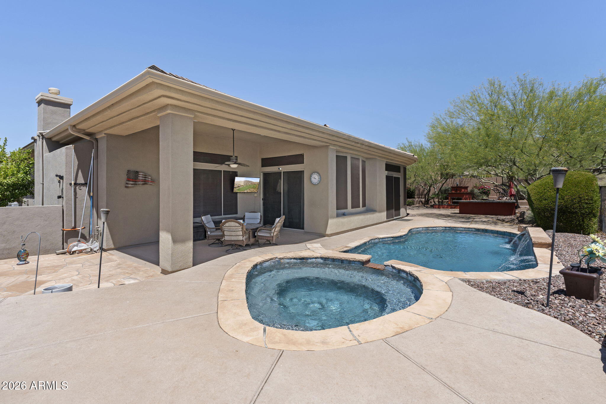 41619 North River Bend Road Anthem, AZ 85086 - Photo 33 of 84 a view of a house with outdoor kitchen