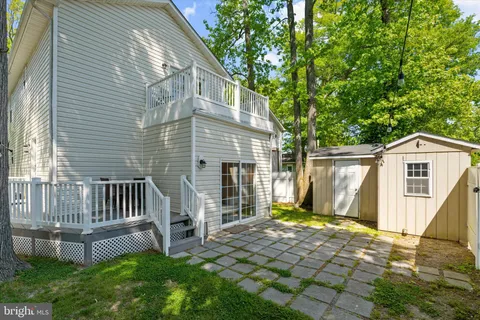 a front view of a house with yard
