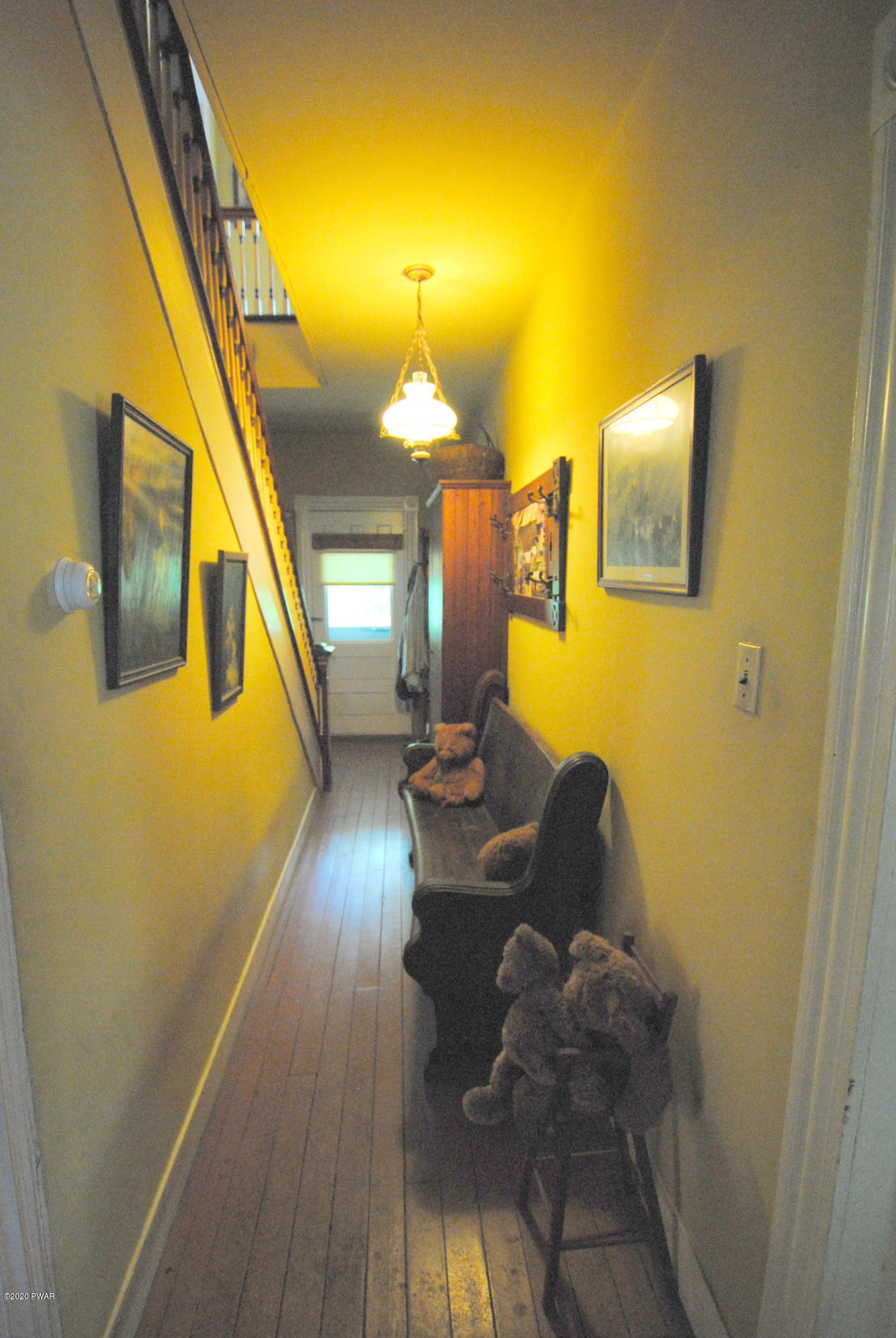 313 Old Racht Road Waymart, PA 18472 - Photo 15 of 39 a workspace with wooden floor and painted walls