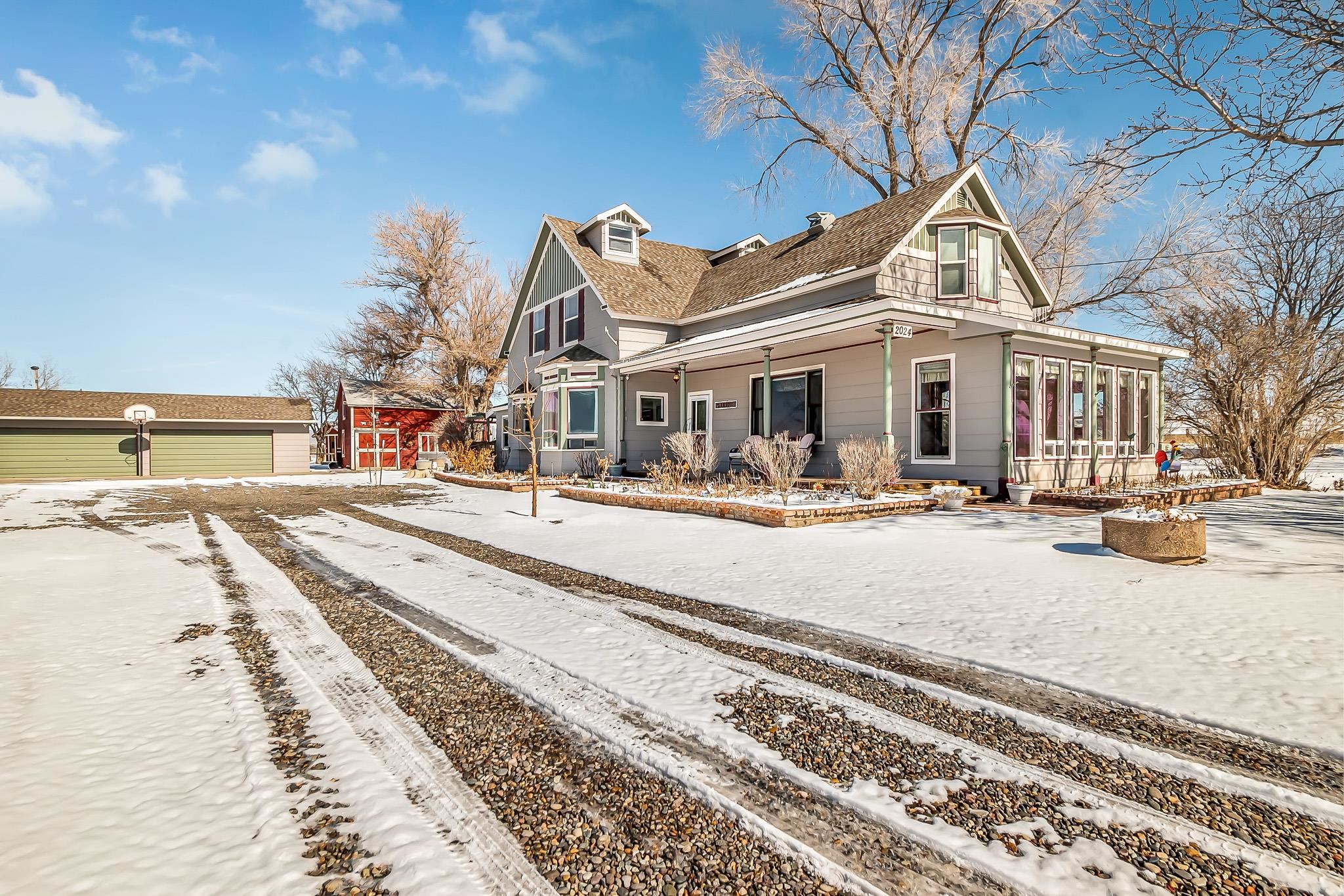2024 L Road Grand Junction, CO 81505 - Photo 2 of 37 a view of a building with a snow on the road