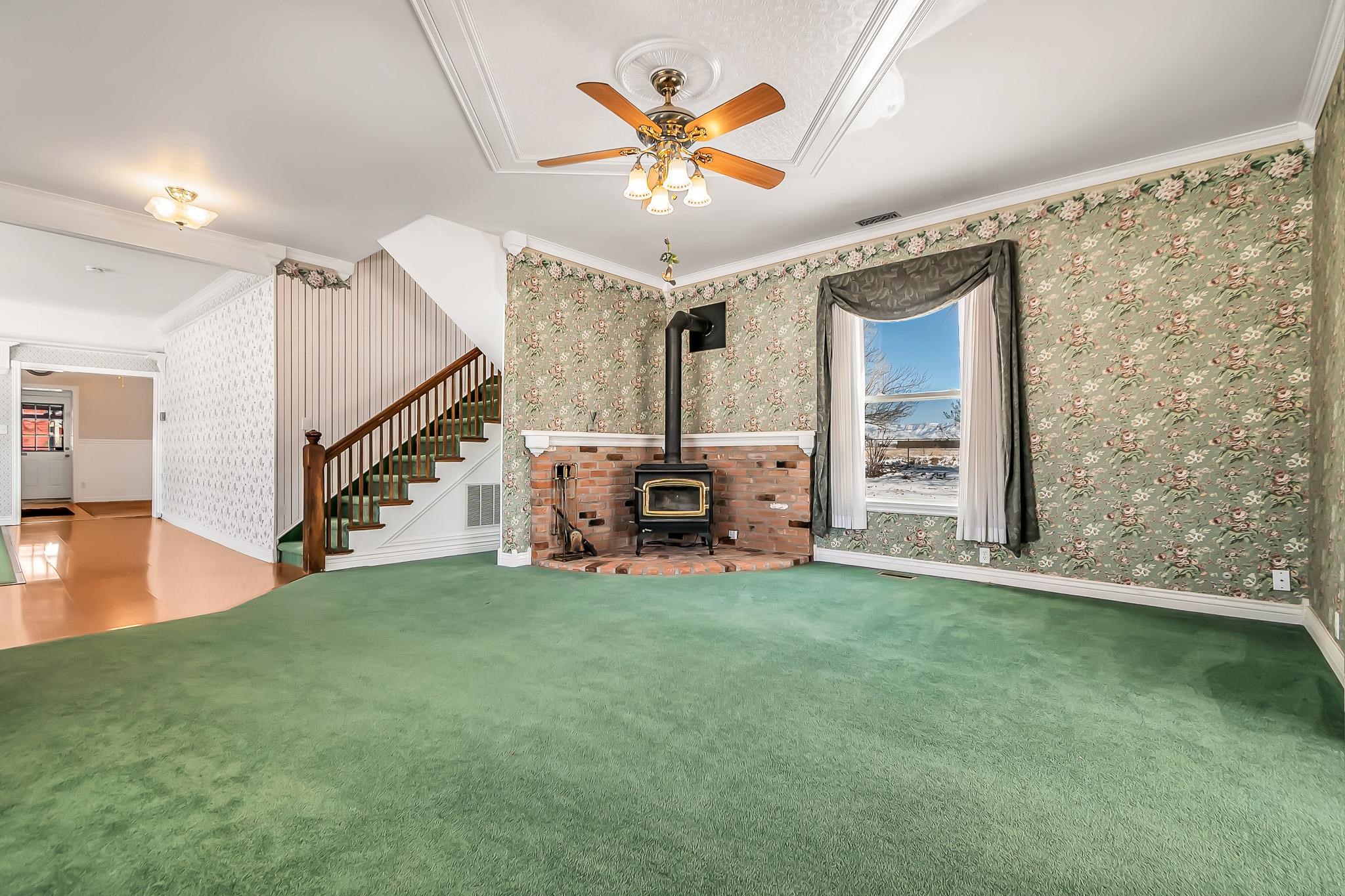 2024 L Road Grand Junction, CO 81505 - Photo 3 of 37 a view of a livingroom with furniture and stairs