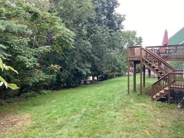22 Cheyenne Road Worcester, MA 01606 - Photo 24 of 24 a view of a house with a backyard