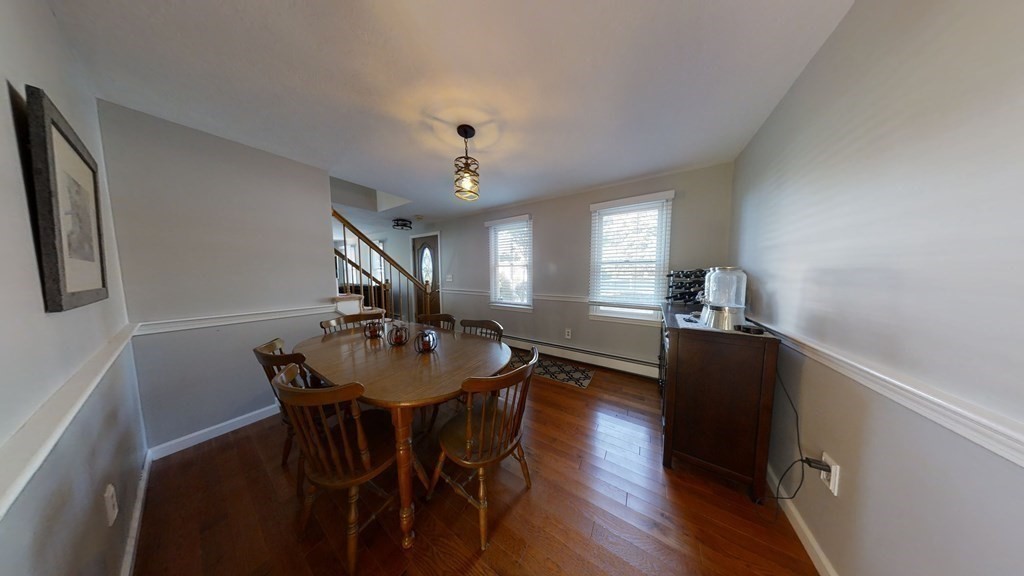 22 Cheyenne Road Worcester, MA 01606 - Photo 6 of 24 a view of a dining room with furniture and wooden floor