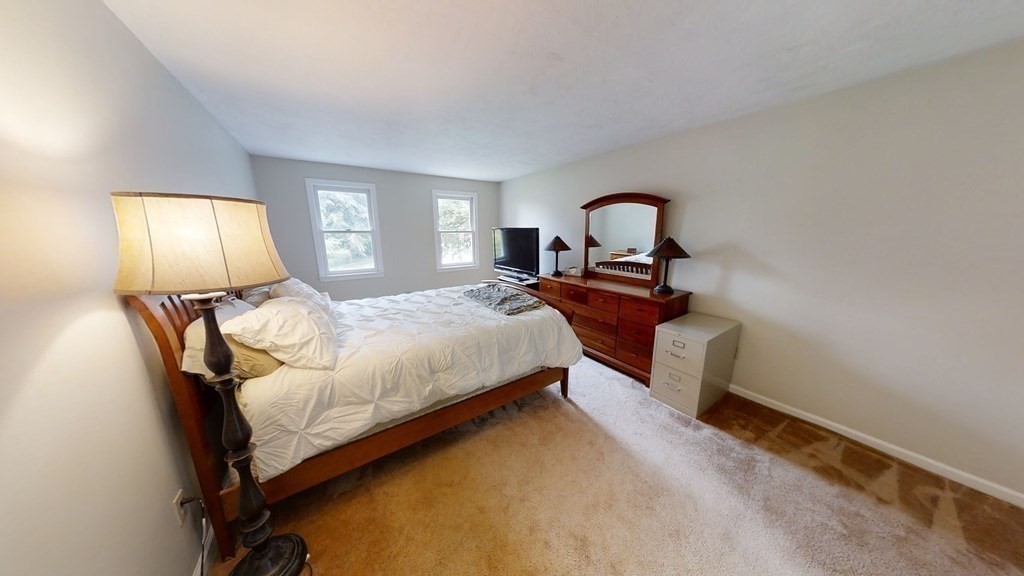 22 Cheyenne Road Worcester, MA 01606 - Photo 9 of 24 a bedroom with a bed chair and window