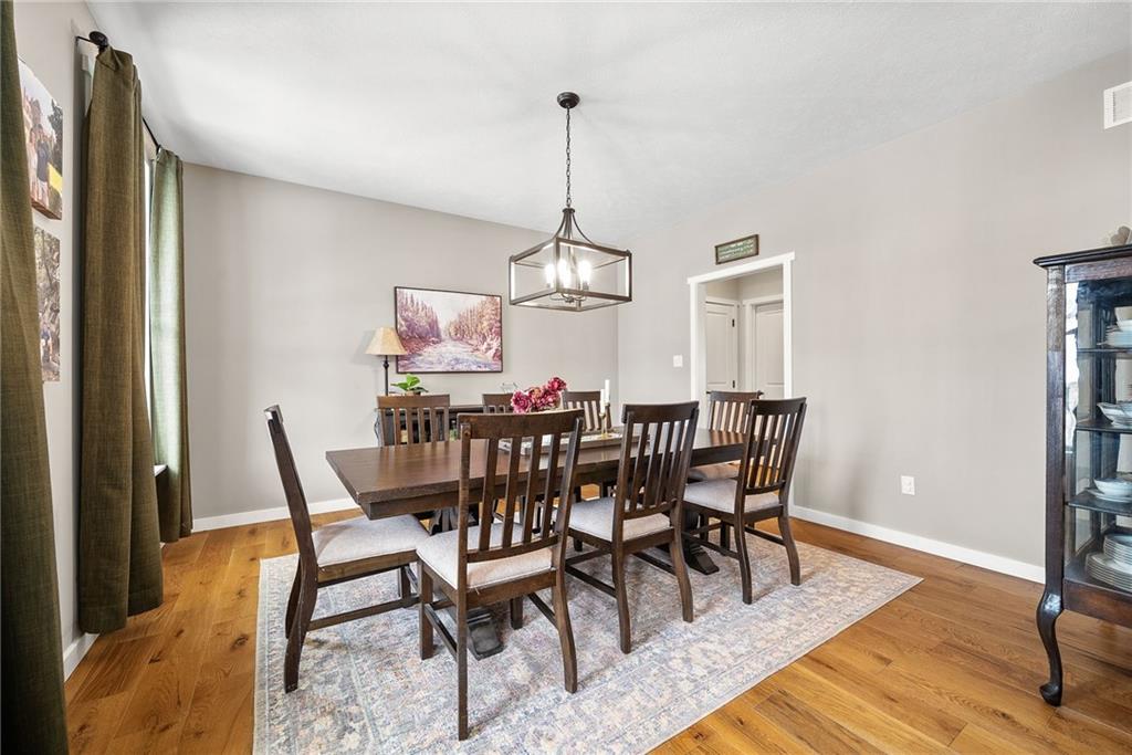 141 Morningstar Drive Belle Vernon, PA 15012 - Photo 12 of 39 a view of a dining room with furniture window and wooden floor