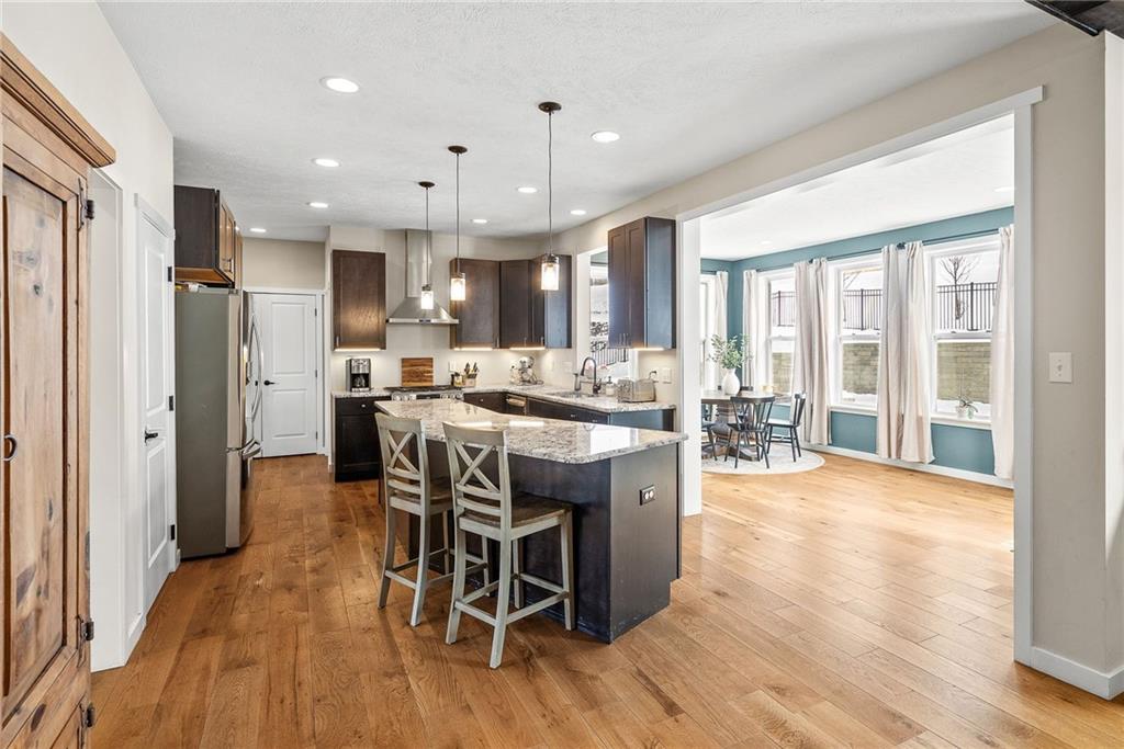 141 Morningstar Drive Belle Vernon, PA 15012 - Photo 14 of 39 a dining hall with stainless steel appliances granite countertop a refrigerator and a stove top oven