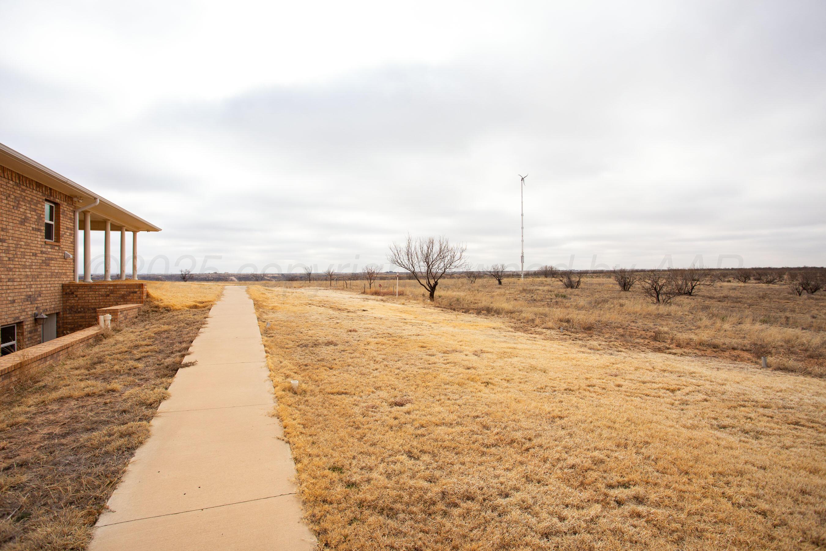 74 Stonebridge Gate Road Amarillo, TX 79124 - Photo 48 of 60 Wind generator