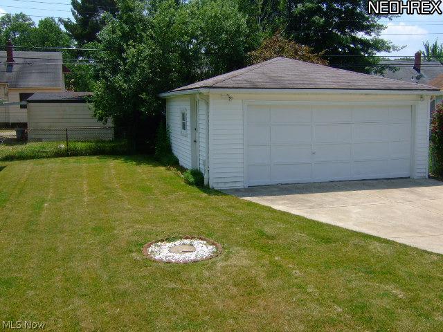 13634 Carpenter Road Garfield Heights, OH 44125 - Photo 2 of 24 The oversized 2 car garage is perfect for your cars, toys, hobbies and storage!