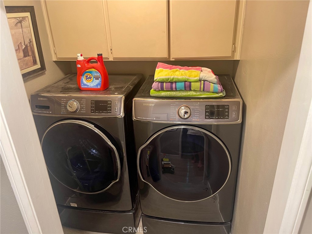 45 Blazewood Lake Forest, CA 92610 - Photo 11 of 13 a utility room with dryer and washer