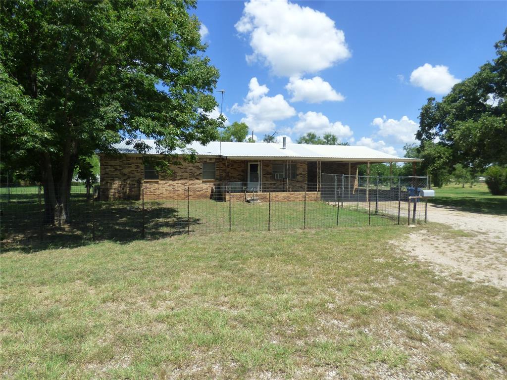 309 East 10th Street Cisco, TX 76437 - Photo 1 of 35 a view of a house with a yard