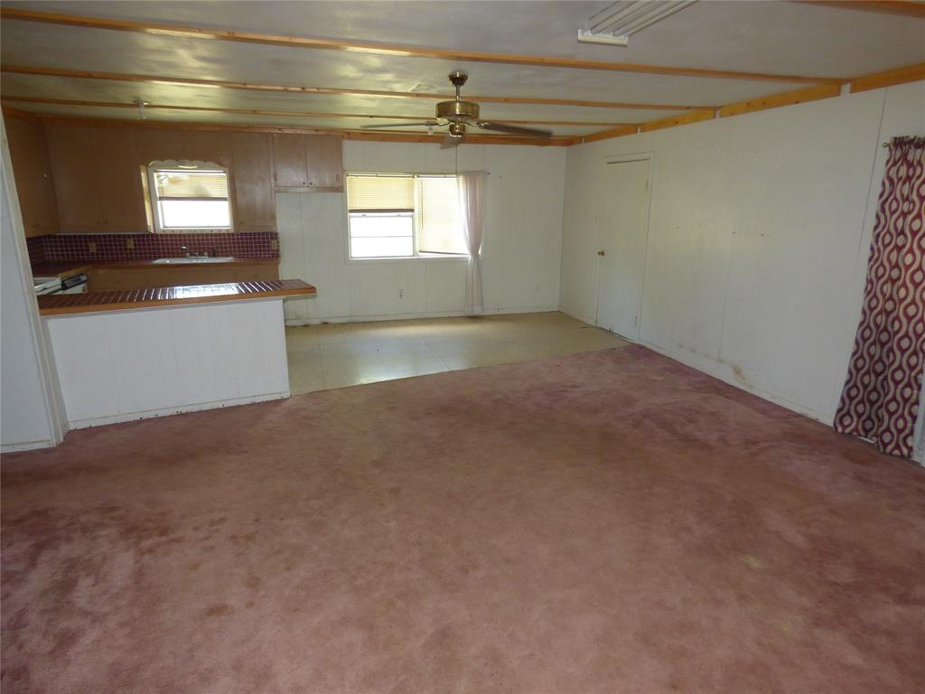 309 East 10th Street Cisco, TX 76437 - Photo 12 of 35 a view of empty room with window