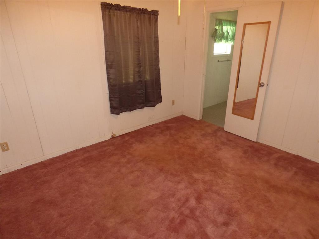 309 East 10th Street Cisco, TX 76437 - Photo 28 of 35 an empty room with windows