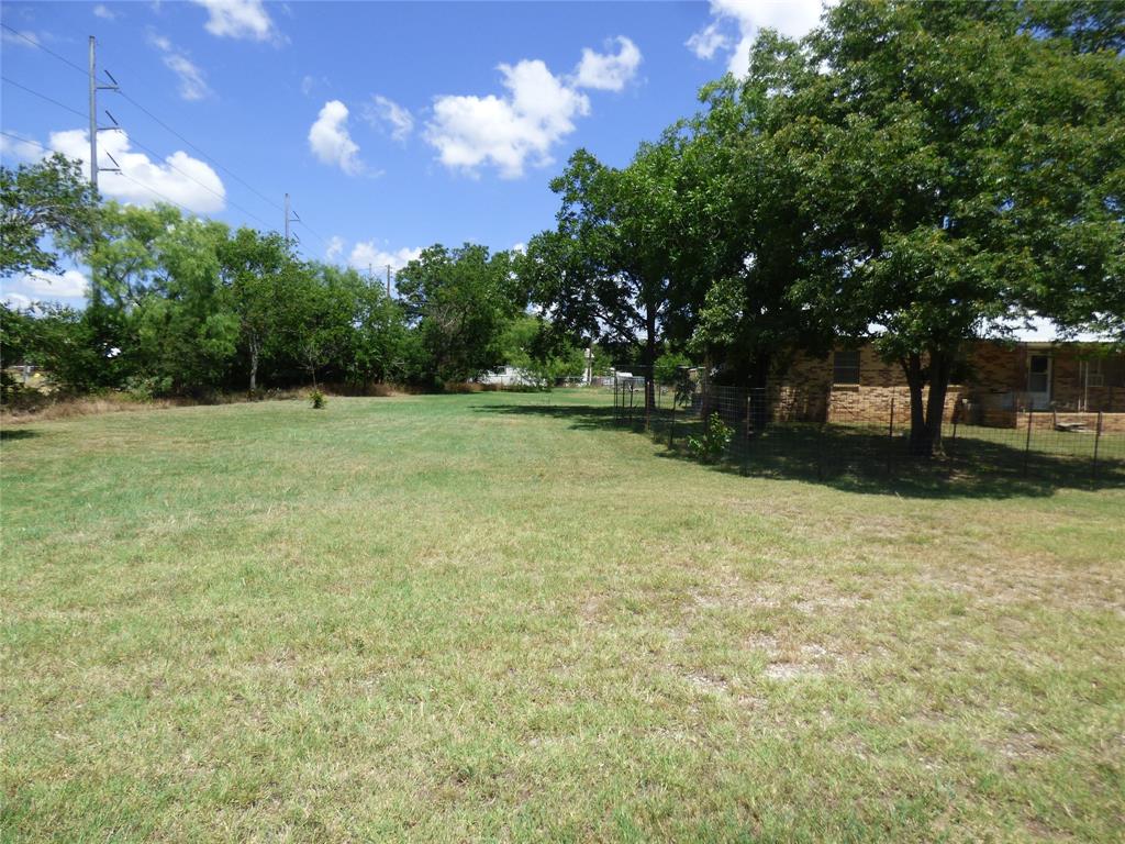 309 East 10th Street Cisco, TX 76437 - Photo 5 of 35 a view of an outdoor space and a yard