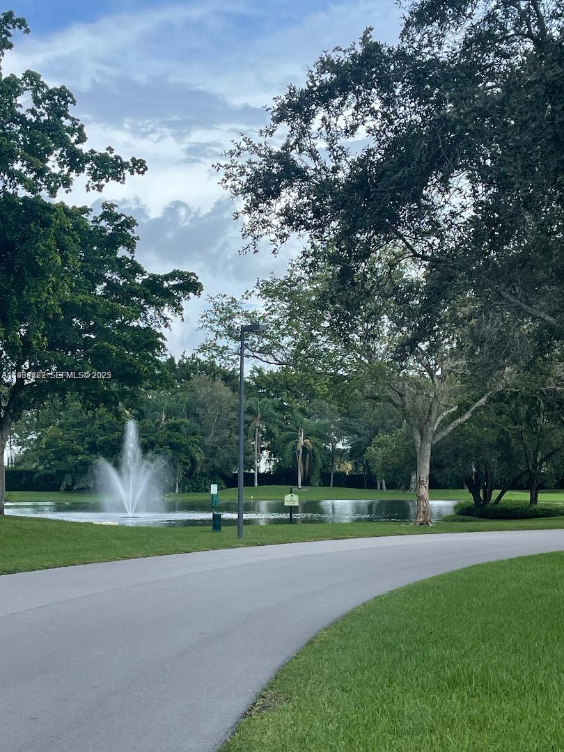 621 Lyons Road, Unit 9201 Coconut Creek, FL 33063 - Photo 19 of 28 a view of a park