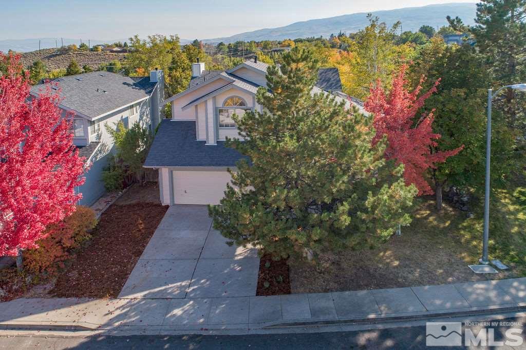 3948 Regal Drive Reno, NV 89503 - Photo 3 of 25 a view of a house with a yard and street view