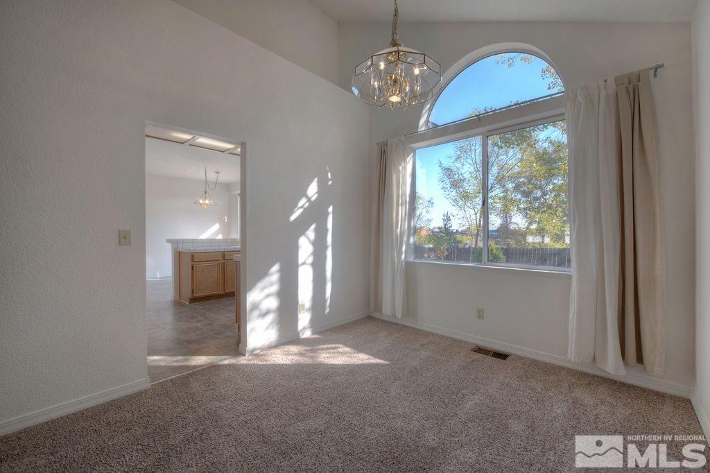 3948 Regal Drive Reno, NV 89503 - Photo 5 of 25 wooden floor in an empty room with a window