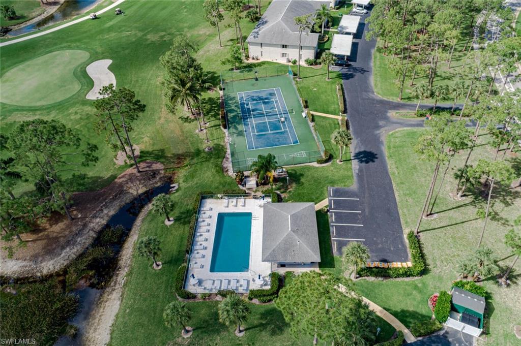 780 Augusta Boulevard, Unit C102 Naples, FL 34113 - Photo 20 of 26 an aerial view of a house