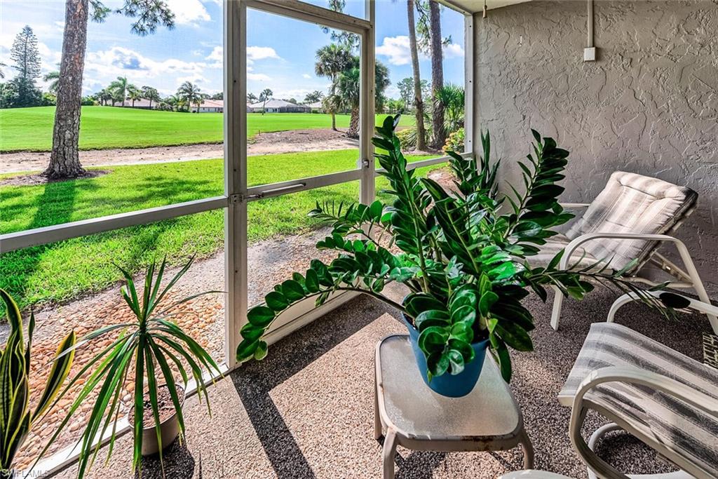 780 Augusta Boulevard, Unit C102 Naples, FL 34113 - Photo 6 of 26 a view of outdoor space and garden