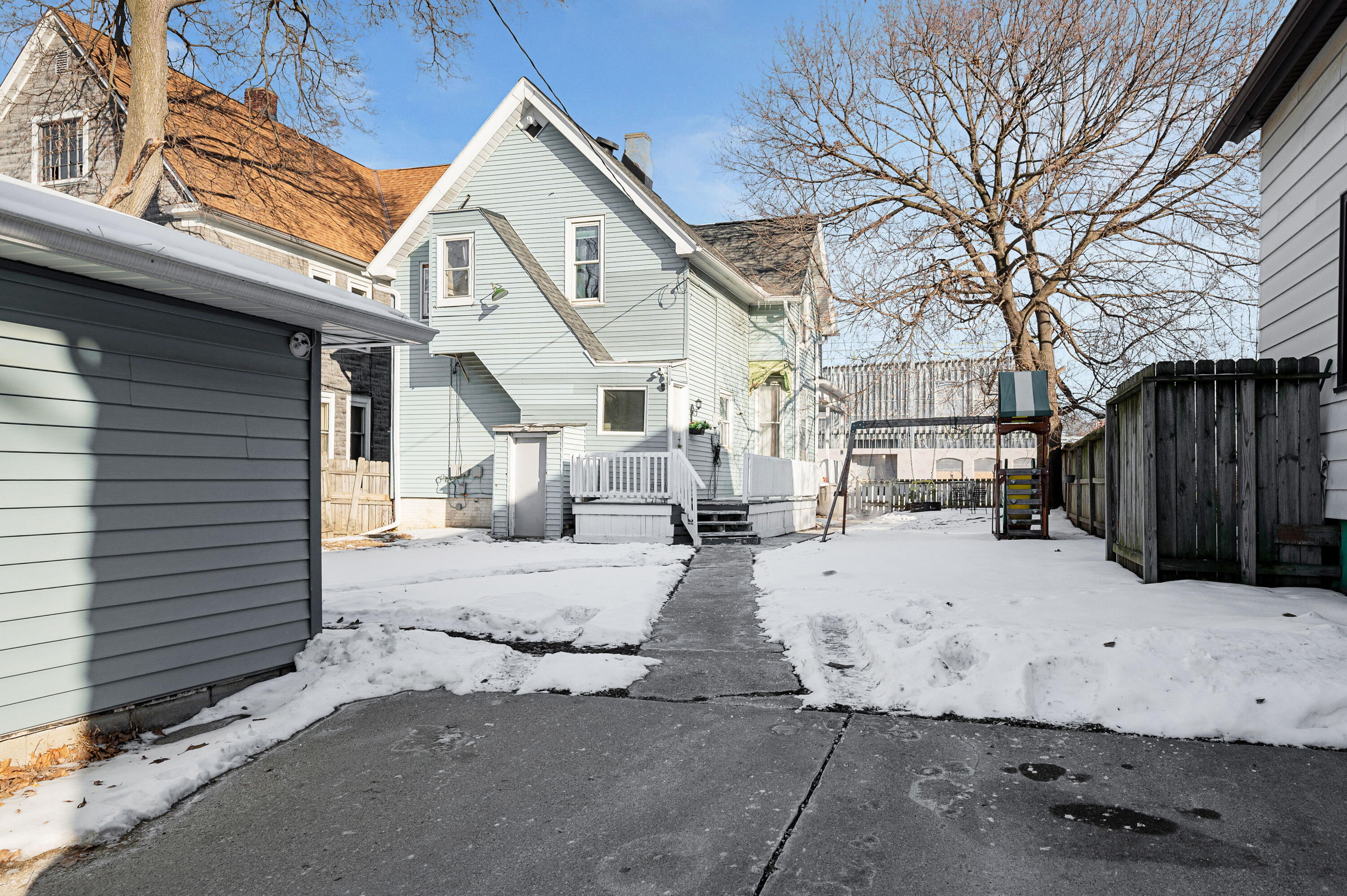 1023 South 25th Street Milwaukee, WI 53204 - Photo 21 of 22 Paved driveway with gate- room for 2 + cars