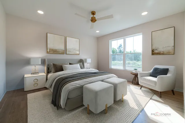 a bedroom with bed and window