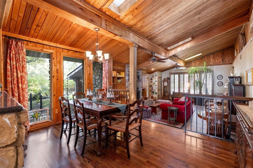 13360 Miller Road Azle, TX 76020 - Photo 13 of 23 a view of a dining room with furniture window and wooden floor