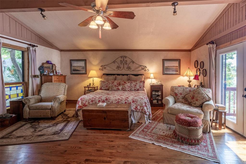 13360 Miller Road Azle, TX 76020 - Photo 9 of 23 a bed room with furniture and wooden floor