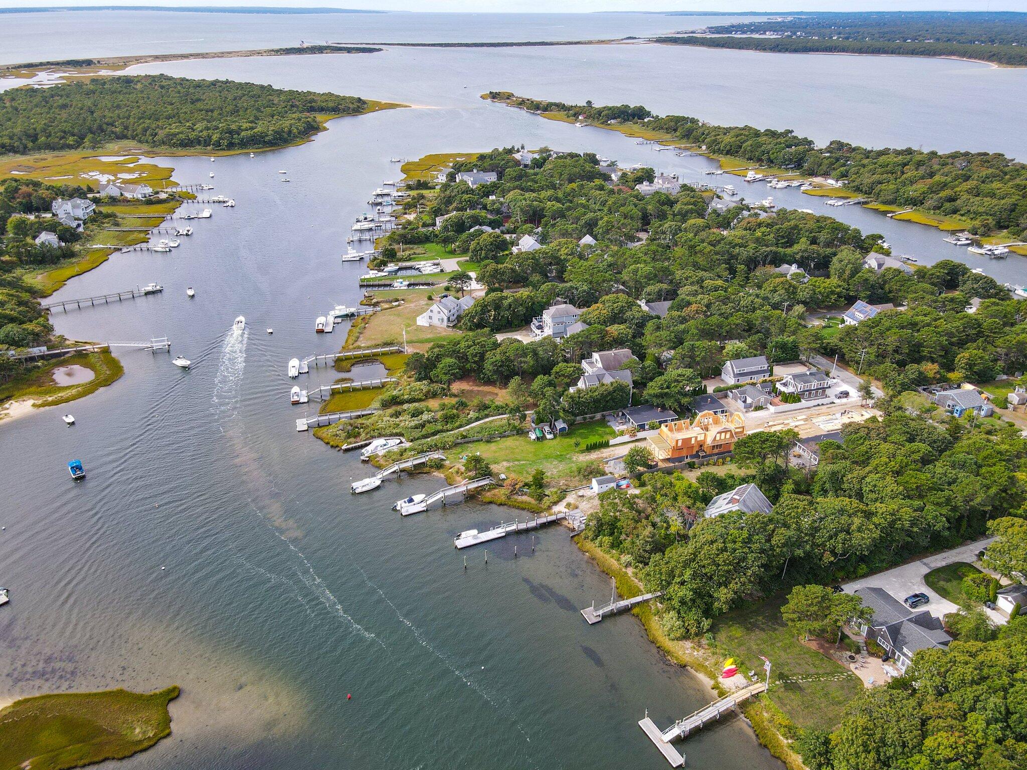 362 Monomoscoy Road Mashpee, MA 02649 - Photo 40 of 48 an aerial view of a houses with a yard