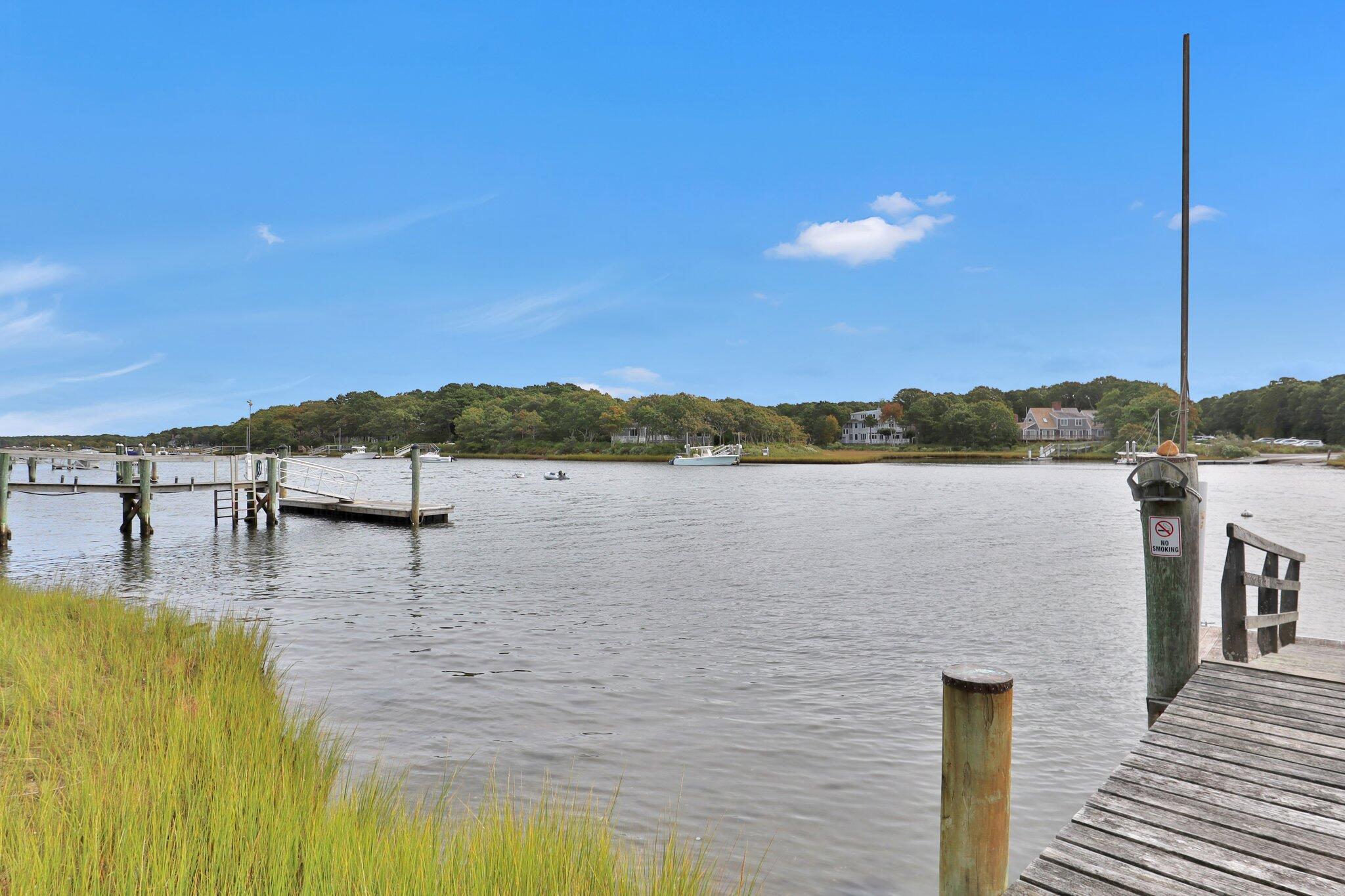 362 Monomoscoy Road Mashpee, MA 02649 - Photo 46 of 48 a view of a lake with houses