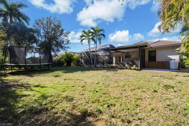 a house view with a swimming pool