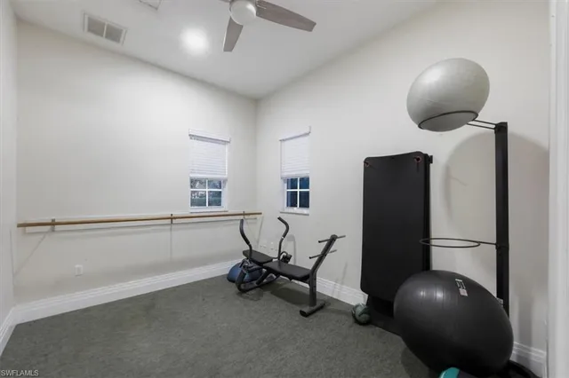 a room with furniture and air hockey table