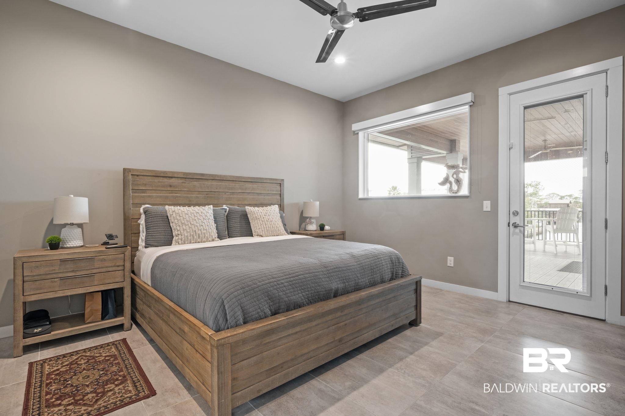 3840 Cotton Way Orange Beach, AL 36561 - Photo 24 of 75 Bedroom with ceiling fan and access to outside
