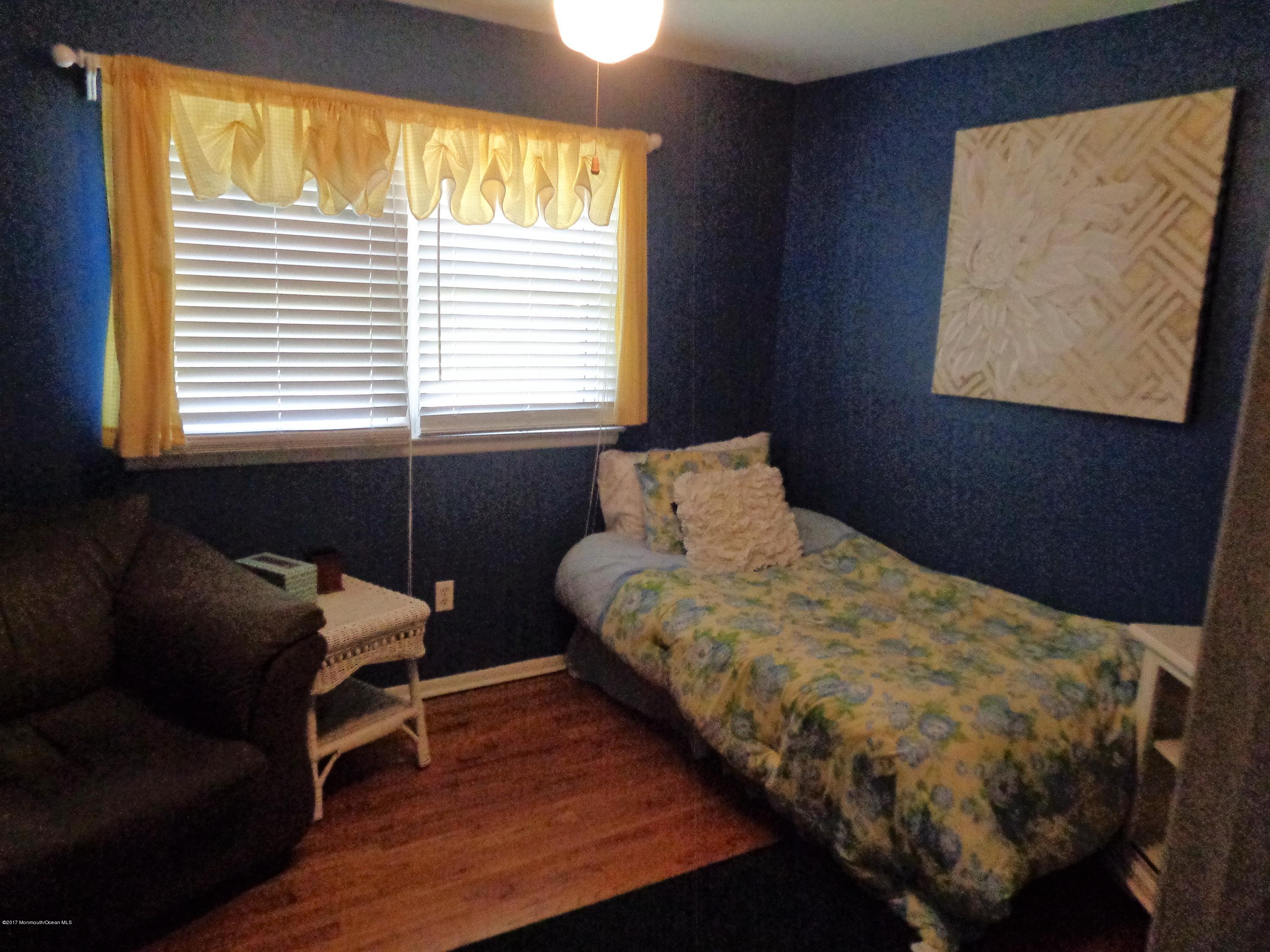 25 Pepperridge Road Howell, NJ 07731 - Photo 14 of 28 a bedroom with bed and window