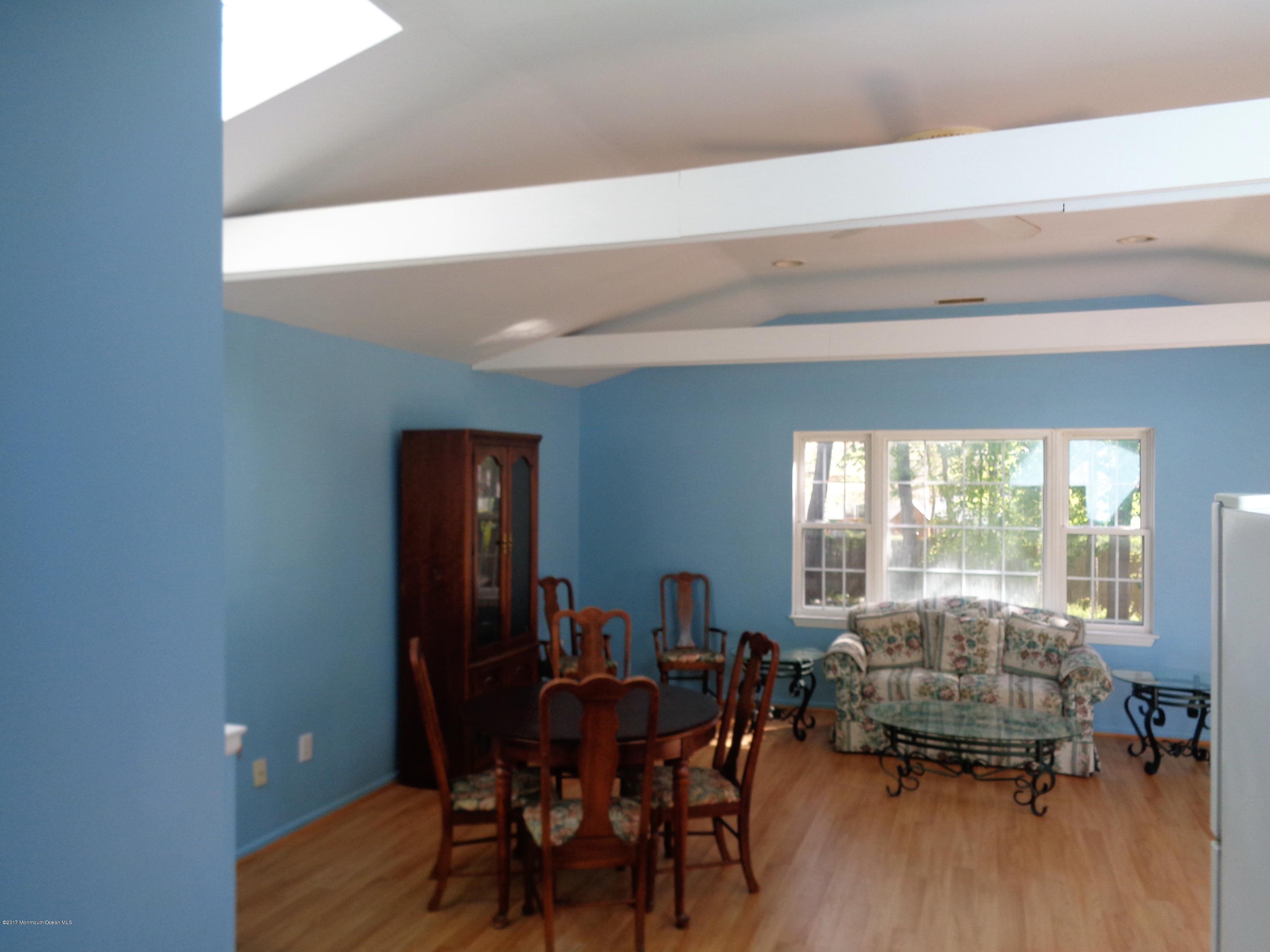 25 Pepperridge Road Howell, NJ 07731 - Photo 21 of 28 a living room with furniture and a window