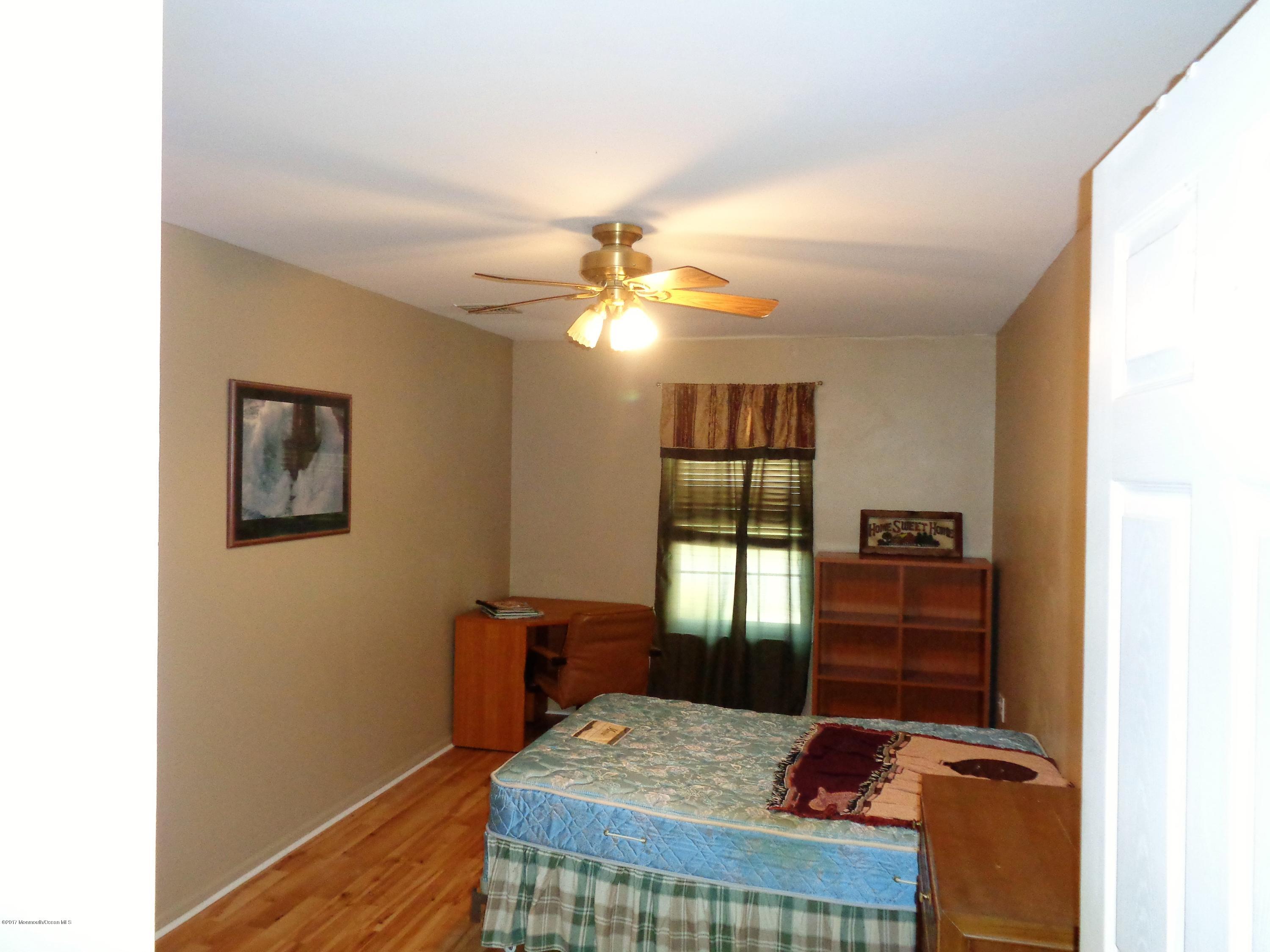 25 Pepperridge Road Howell, NJ 07731 - Photo 24 of 28 a view of a hallway with workspace