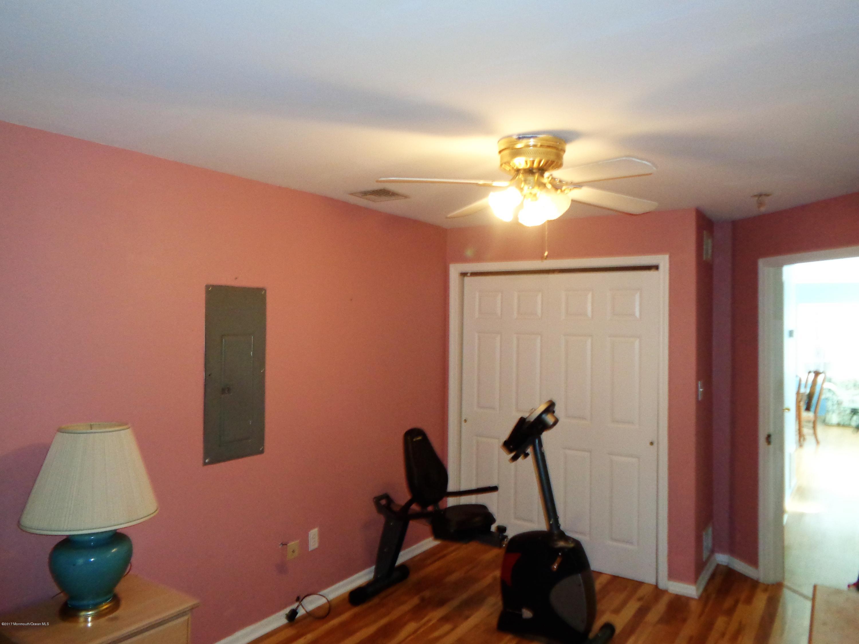 25 Pepperridge Road Howell, NJ 07731 - Photo 27 of 28 a room with gym equipment
