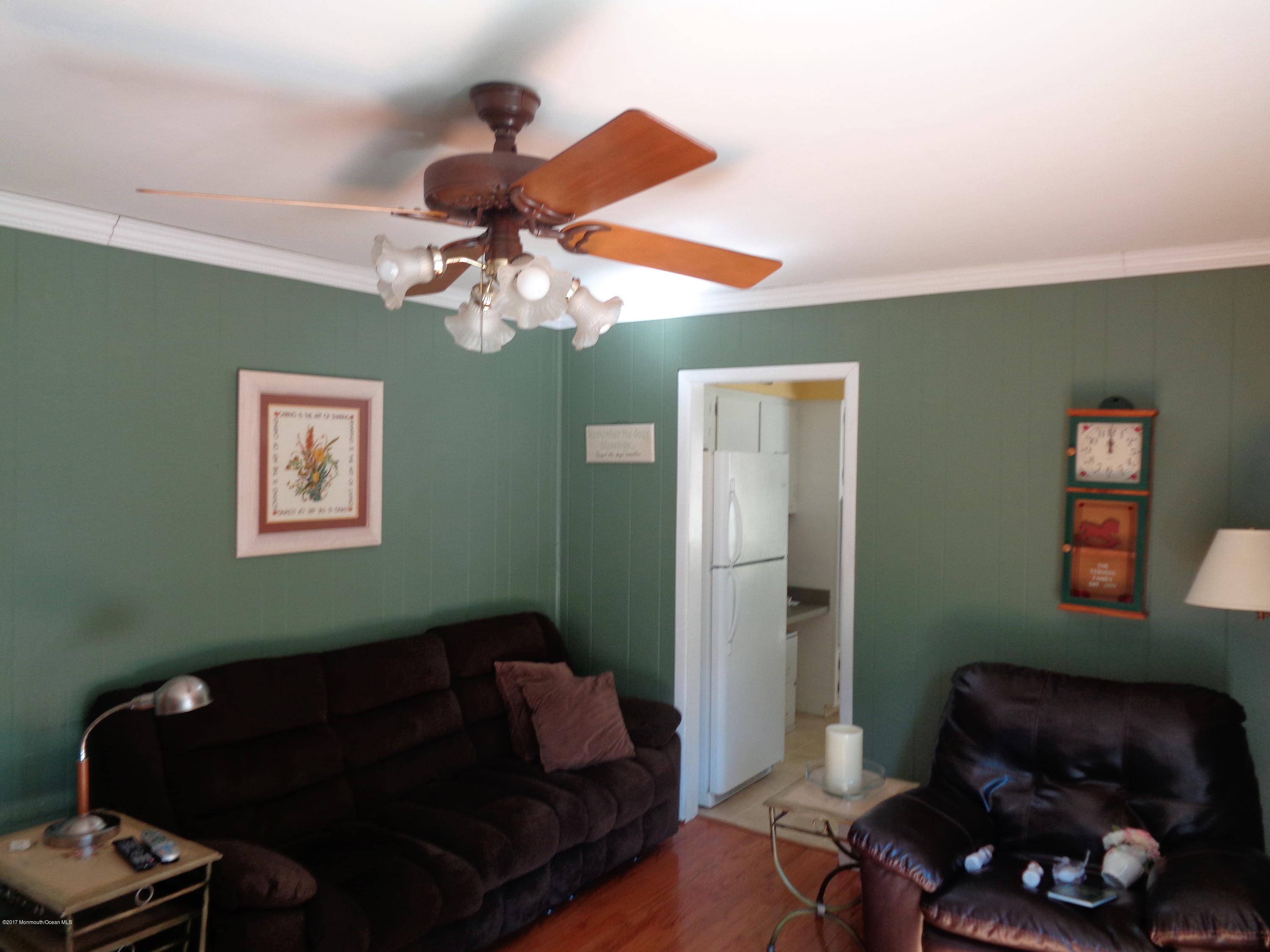 25 Pepperridge Road Howell, NJ 07731 - Photo 10 of 28 a living room with furniture and a window