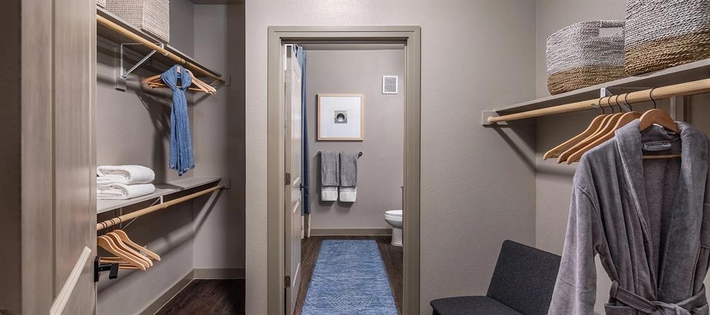 880 Lake Carolyn Parkway, Unit 355 Irving, TX 75039 - Photo 5 of 18 a view of closet with wooden floor