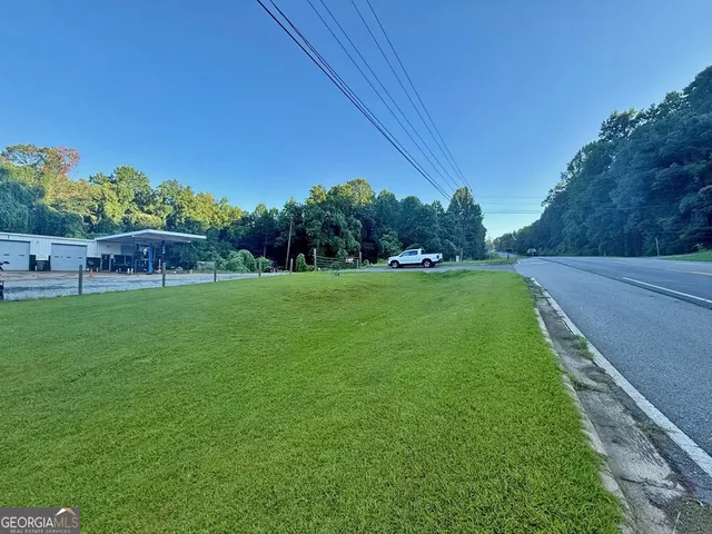 a view of a backyard with a garden