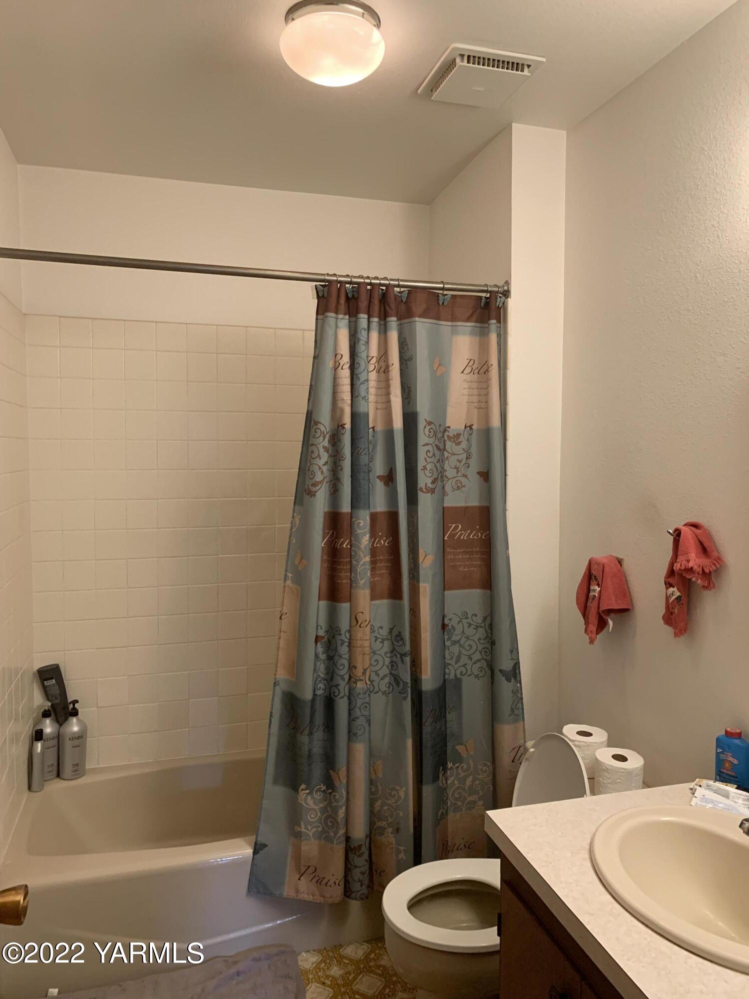 11105 Occidental Road Yakima, WA 98903 - Photo 25 of 30 a bathroom with a sink and a mirror