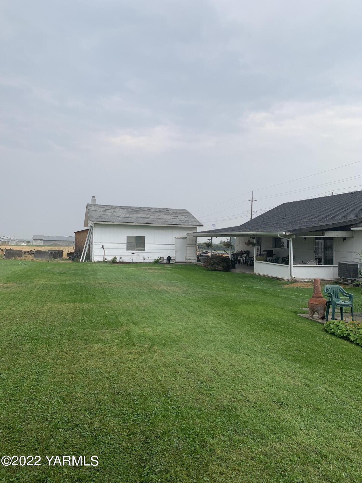 11105 Occidental Road Yakima, WA 98903 - Photo 4 of 30 a view of house with backyard