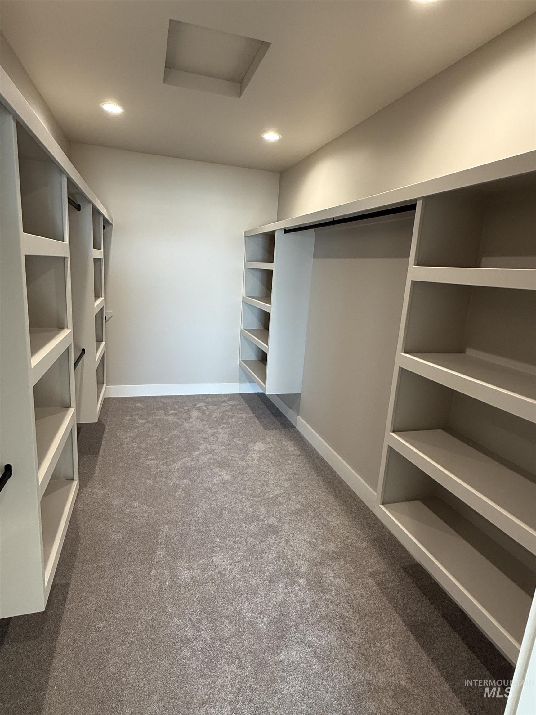 14059 Mulberry McCall, ID 83638 - Photo 13 of 32 Walk in closet featuring attic access and dark carpet