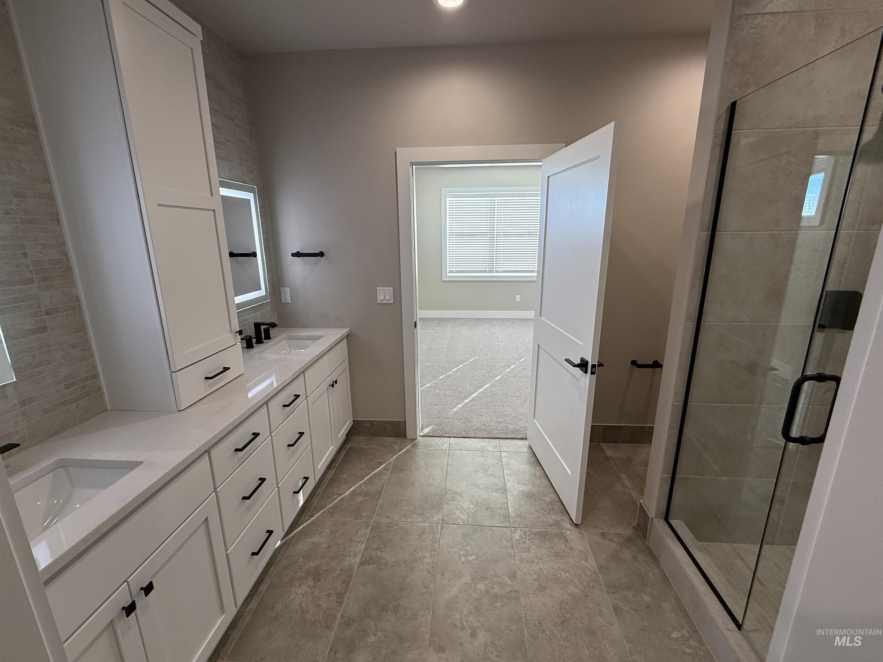 14059 Mulberry McCall, ID 83638 - Photo 14 of 32 Full bath featuring double vanity, a shower stall, and recessed lighting